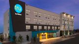 Hilton reports growth in midscale and upper-midscale chains like Tru.