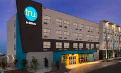 Hilton reports growth in midscale and upper-midscale chains like Tru.