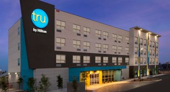 Hilton reports growth in midscale and upper-midscale chains like Tru.