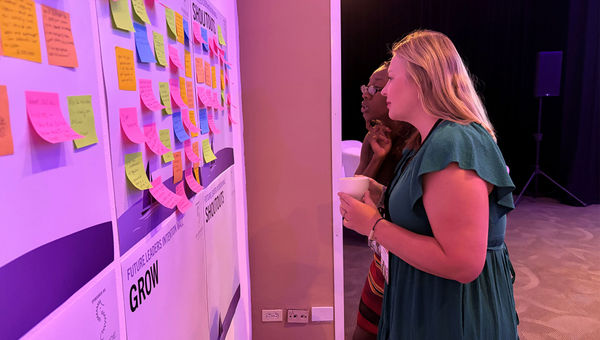 Shannon Sellers of Coastal and Main Travel Company (front) and Jenni Nnoli of Santa Barbara Travel Bureau at the Future Leaders Intention Wall. Shannon Sellers of Coastal and Main Travel Company (front) and Jenni Nnoli of Santa Barbara Travel Bureau at the Future Leaders Intention Wall.