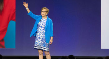 Nexion Travel Group president Jackie Friedman on stage at Nexion's CoNexion 2026 in Austin, Texas.
