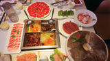 The table is set for a meal at Da Miao Hotpot in Chengdu's Kuanzhai Alley, an area of the Chinese city with a vibrant street culture.