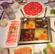 The table is set for a meal at Da Miao Hotpot in Chengdu's Kuanzhai Alley, an area of the Chinese city with a vibrant street culture.