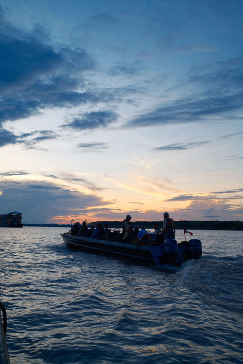 Skiff ride back to the ship at sunset. Skiff ride back to the ship at sunset.