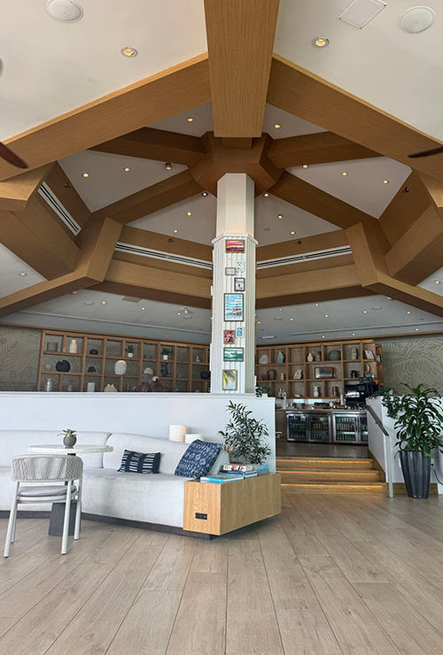 The indoor section of the Club offers a buffet area in the back for food and drinks, and plenty of seating closer to the floor-to-ceiling windows. The indoor section of the Club offers a buffet area in the back for food and drinks, and plenty of seating closer to the floor-to-ceiling windows.