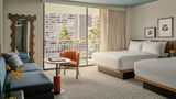Guestrooms at Romer House Waikiki have a relaxed, residential feel.