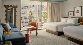 Guestrooms at Romer House Waikiki have a relaxed, residential feel.
