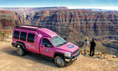 The custom climate-controlled Jeep includes leather captain's chairs and oversized windows.