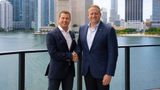 Sandals executive chairman Adam Stewart (left) with Royal Caribbean Group CEO Jason Liberty.