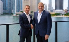 Sandals executive chairman Adam Stewart (left) with Royal Caribbean Group CEO Jason Liberty.