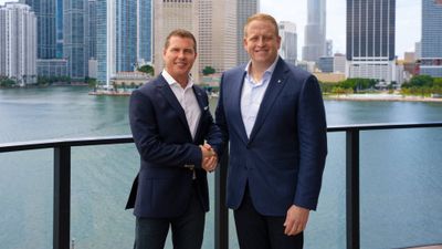 Sandals executive chairman Adam Stewart (left) with Royal Caribbean Group CEO Jason Liberty.