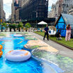 A 3D chalk mural of the lazy river at Disney’s Lakeshore Lodge, created by street artist Tracy Lee Stum.