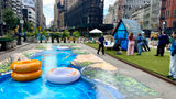 A 3D chalk mural of the lazy river at Disney’s Lakeshore Lodge, created by street artist Tracy Lee Stum.