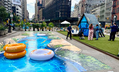 A 3D chalk mural of the lazy river at Disney’s Lakeshore Lodge, created by street artist Tracy Lee Stum.