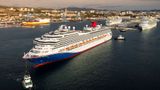 The refreshed Carnival Freedom departs the shipyard in Marseille, France.