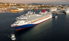 The refreshed Carnival Freedom departs the shipyard in Marseille, France.