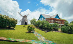 Trois Rivieres Distillery is recognizable by its landmark windmill.