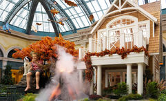 A young fisherman and his dog are depicted in “Casting Tranquility … Autumn Artistry” at Bellagio’s Conservatory & Botanical Gardens in Las Vegas.
