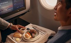 Delta One's new food menus were created by chef Simon Hulstone, who led a Michelin-star restaurant for 20 years.