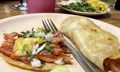Adding pineapple to al pastor tacos is a must.