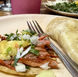 Adding pineapple to al pastor tacos is a must.