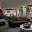 The Christmas Suite at Westgate Las Vegas Resort and Casino has three festively decorated trees along with traditional lights, garlands and an electric fireplace.