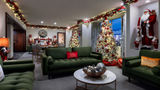 The Christmas Suite at Westgate Las Vegas Resort and Casino has three festively decorated trees along with traditional lights, garlands and an electric fireplace.