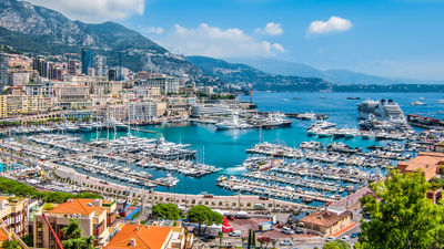 A panoramic view of Monte Carlo harbor in Monaco. Beyond the tourism highlights -- visiting the opulent casino, watching the changing of the guard and gawking at the trappings of wealth -- a deeper dive can be rewarding.
