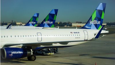 JetBlue planes at New York JFK. The airline is ending its merger plans with Spirit.