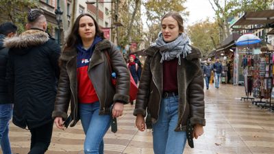 For a trip from New York to Barcelona, Kayak's tool recommends travel in October. Pictured, visitors on Las Ramblas in Barcelona.