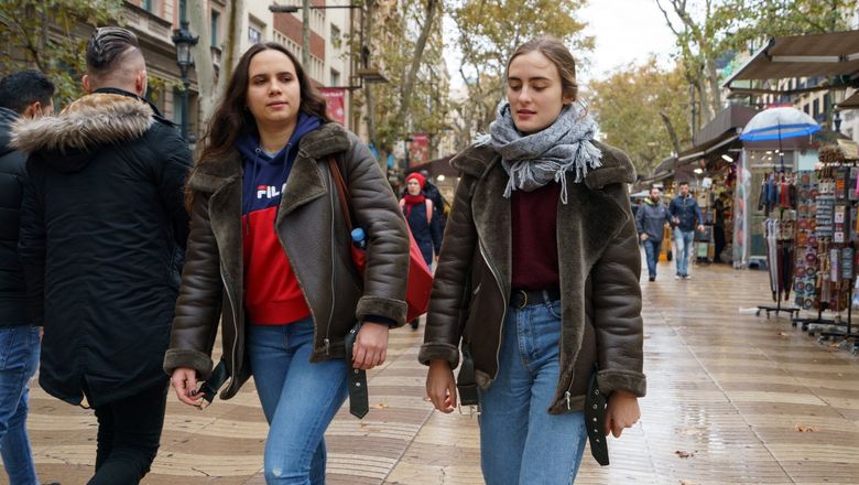 For a trip from New York to Barcelona, Kayak's tool recommends travel in October. Pictured, visitors on Las Ramblas in Barcelona.