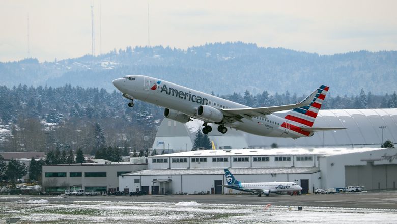 American Airlines and Alaska Airlines jets at Portland International Airport.