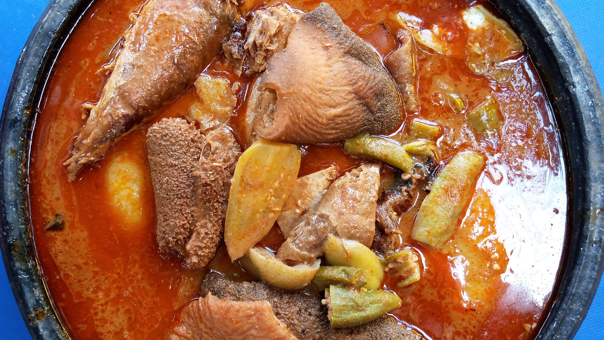 Fufu is a popular dish from Ghana's Ashanti region made from boiled starchy roots such as yams and served with soups and stews.