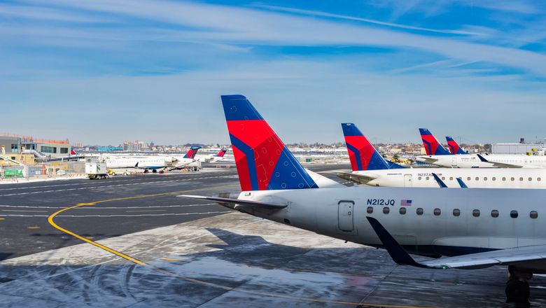 Delta planes at LaGuardia Airport.