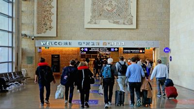 Travelers at Ben Gurion Airport in Tel Aviv.