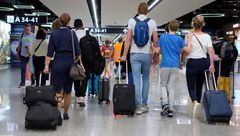 Travelers at Rome's Leonardo da Vinci-Fiumicino Airport.