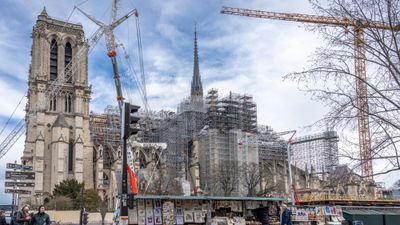 Restoration continued on Notre Dame Cathedral last month. The church will reopen to visitors in December.