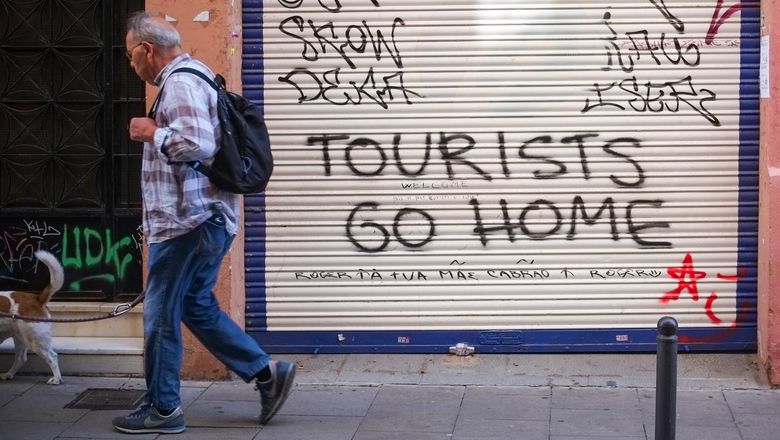 Anti-tourism graffiti in Barcelona.