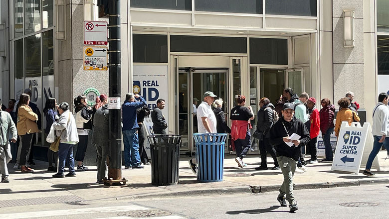People gather to apply for a Real ID-compliant driver's license or ID card in Chicago in April.