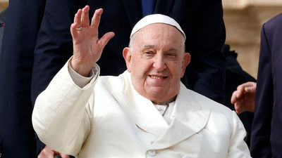 Pope Francis waves to the crowd in St. Peter's Square at the Vatican on Nov. 13, 2024.