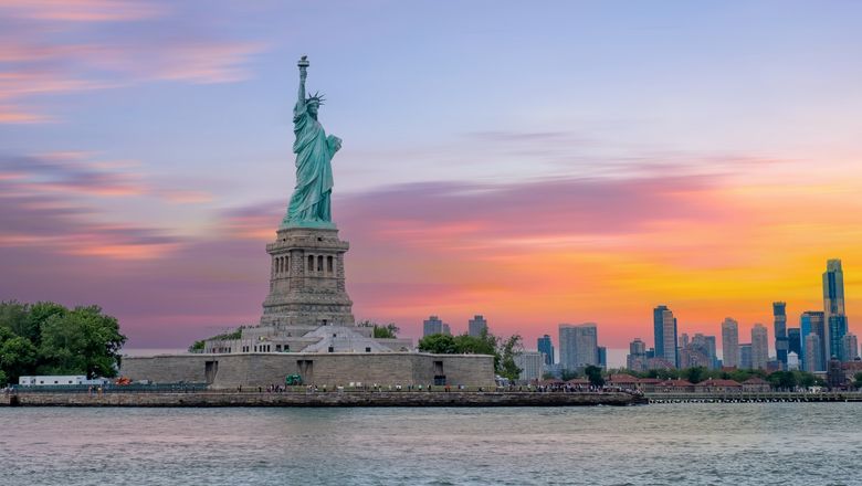 New York said it recorded a slight increase in visitors last year. Pictured, the Statue of Liberty one of the area's most notable attractions.