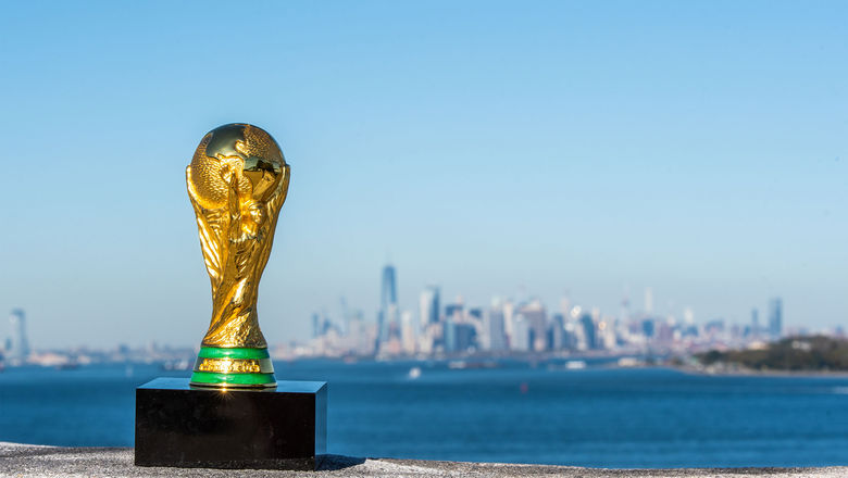 The World Cup trophy with New York in the background. The U.S., Canada and Mexico will host the 2026 tournament.