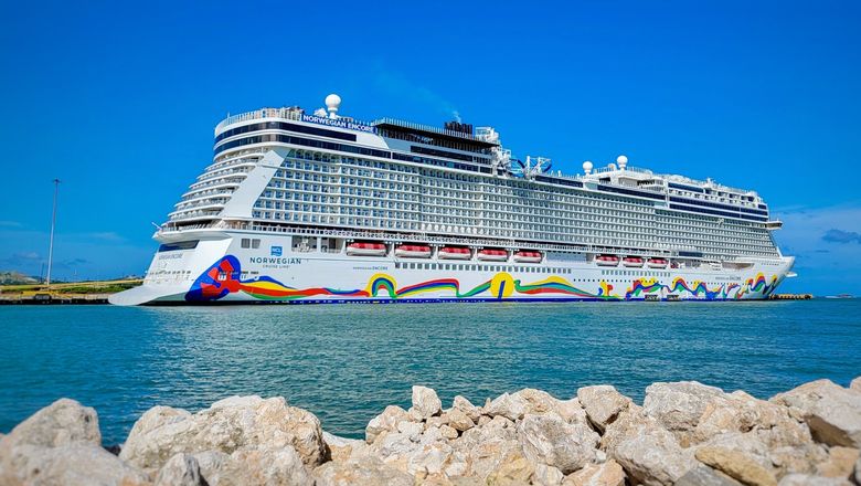 Norwegian Cruise Line Holdings will increase its Caribbean deployment by 10% in 2026. Pictured, the Norwegian Encore in Puerto Plata, D.R.