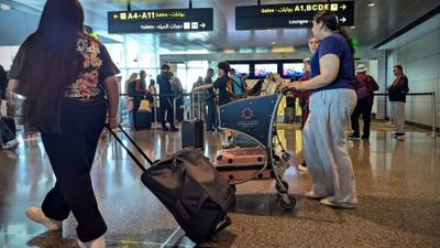 Travelers at Hamad Airport in Doha, Qatar, in 2025. Since the start of the Iran-U.S. war on Feb. 28, Qatari airspace and the airport have been closed.