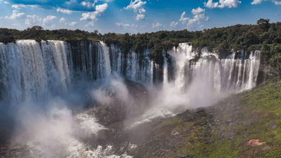 At about 350 feet high and almost 1,000 feet wide at peak flow, Angola's Kalandula Falls is regularly called the "little sister" to Victoria Falls.