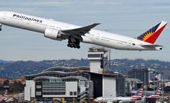 A Philippine Airlines Boeing 777 taking off in Los Angeles.