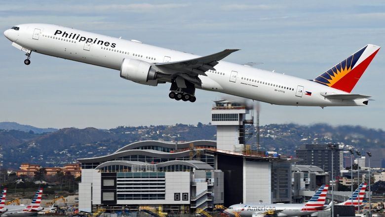 A Philippine Airlines Boeing 777 taking off in Los Angeles.