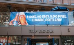 A banner outside the Samuel Adams Tap Room in Boston celebrating the Scottish soccer fans.