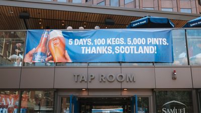 A banner outside the Samuel Adams Tap Room in Boston celebrating the Scottish soccer fans.