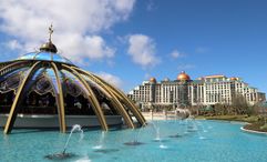 The Constellation Carousel at the Epic Universe theme park. The Universal Helios Grand Hotel is in the background.